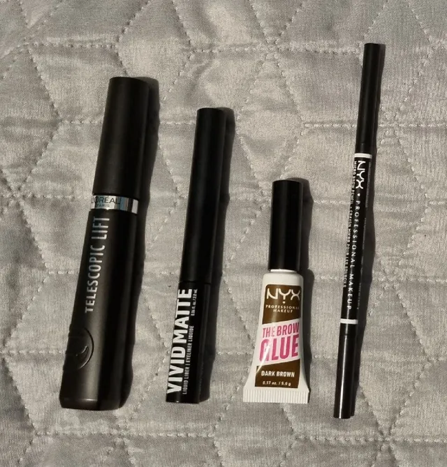 Amazing mascara, liquid eyeliner, brow glue and brow pencil