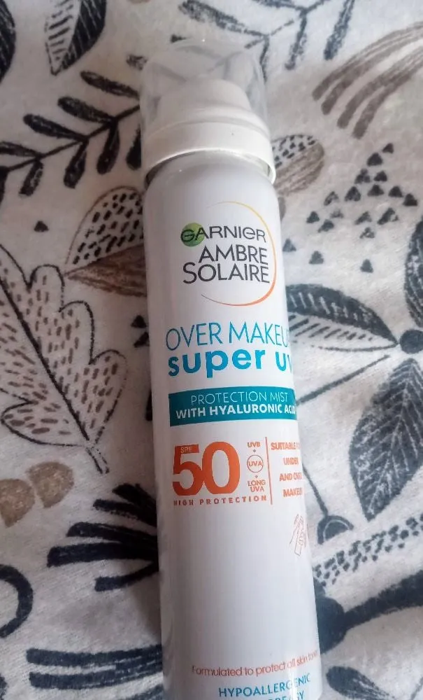 I love this product. Garnier Ambre Solaire over make up